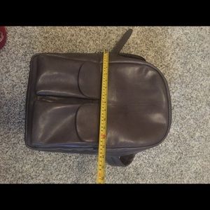 100% leather backpack no brand or tag